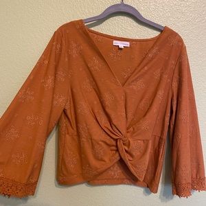 Orange embroidered blouse